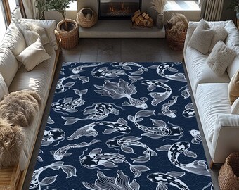 May include: A rectangular area rug with a navy blue background and a repeating pattern of white koi fish. The fish vary in size and orientation, with detailed outlines and shading. The rug is placed in a living room setting with white sofas and a fireplace.