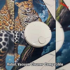 May include: A white robot vacuum cleaner sits on a rug featuring a leopard design. The rug has a blue background with a tree branch. The text "Robot Vacuum Cleaner Compatible" is at the bottom.
