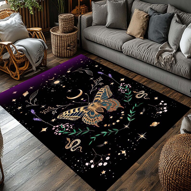 May include: A rectangular black area rug with a celestial design. It features a large butterfly with gold and blue wings, a crescent moon, stars, and a snake. The rug has a purple gradient border and is placed on a wooden floor.