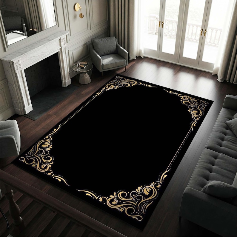 May include: Black area rug with a gold ornate border design. The rug has a classic, elegant style.