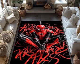 May include: A rectangular black rug featuring a vibrant illustration of Spider-Man in a crouching pose. The superhero is depicted in his classic red and black suit, surrounded by red graffiti-style text.
