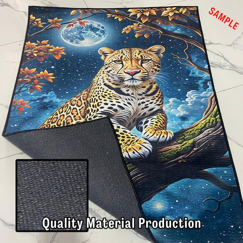 May include: A rectangular rug featuring a detailed illustration of a leopard resting on a tree branch under a full moon. The rug has a dark blue background with a starry night sky and autumn-colored leaves. The text "Quality Material Production" is visible.