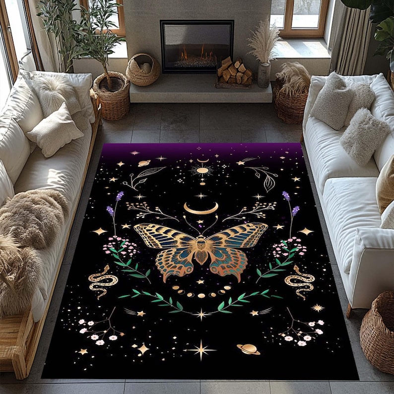May include: A black rectangular area rug featuring a large butterfly with gold and blue wings, surrounded by celestial and botanical elements. The rug has a purple gradient at the top and is decorated with stars, moons, and floral designs.