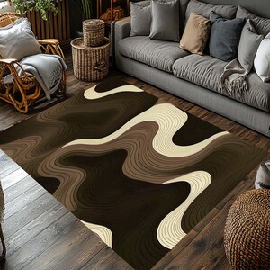 May include: A rectangular area rug with a flowing, layered design in shades of brown and cream. The rug features a pattern of curved lines, creating a sense of depth and movement. The rug is placed on a wooden floor, and is a home decor item.