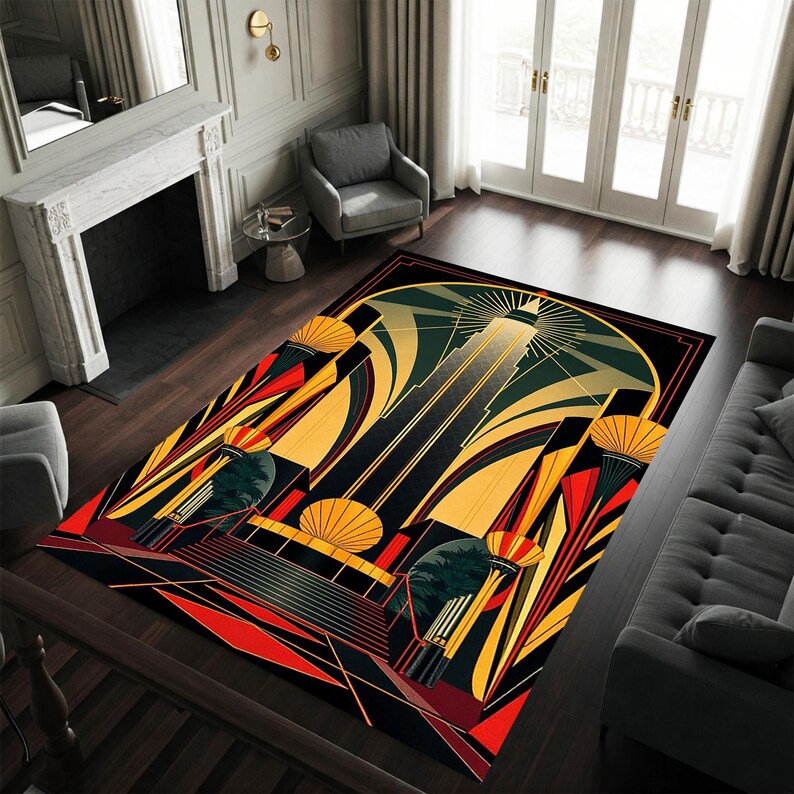 May include: A rectangular area rug with an Art Deco design. The rug features a black background with geometric shapes in shades of yellow, red, and green. The design includes stylized sunbursts and vertical lines, creating a bold and striking pattern.