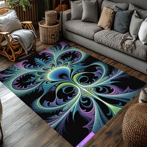 May include: A large, rectangular area rug with a vibrant, abstract floral design. The rug features a black background with a central blue and yellow flower-like pattern, surrounded by teal, purple, and green swirling shapes. The rug is placed on a wooden floor.