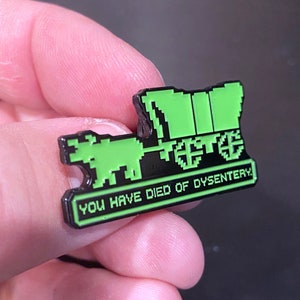 Oregon Trail Pin Oregon Trail You Have Died of Dysentery Oregon Trail Enamel Pin Video Game Pin Video Game Gift Video Game Enamel Pin Game