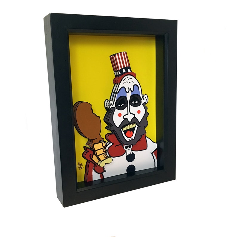 May include: A framed 3D illustration of a cartoon character with a red, white, and blue hat, a white beard, and a red bow tie. The character is holding a brown chicken leg and has a yellow background.
