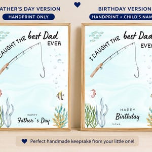 May include: Two framed prints featuring a light blue underwater background with a fishing rod illustration and the text I CAUGHT THE best Dad EVER. One print says HAPPY Father's Day, the other says HAPPY Birthday with space for a handprint.