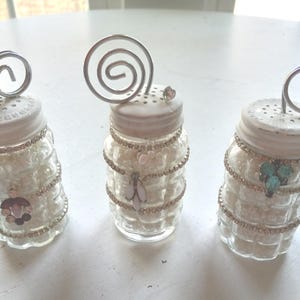 three repurposed glass saltshakers, photo display, photo mounts, posted notes, embellished with vintage jewelry, cottage chic, shabby chic