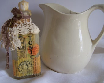 altered vintage bottle/vintage ephemera/collectable/mixed media /salvaged materials/country cottage/farmhouse decor/