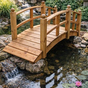 Könnte beinhalten: Ein Set aus drei Keramikbechern mit gesprenkelter, matter Oberfläche. Die Becher sind in Creme-, Hellbraun- und Dunkelbrauntönen gehalten. Jeder Becher hat ein schlichtes, minimalistisches Design.