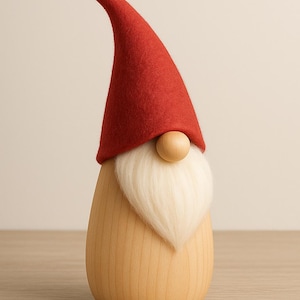 May include: A wooden gnome ornament featuring a red felt hat and a white beard. The gnome has a round wooden nose and a light wood body. The hat is tall and curved. The figurine is a decorative item.