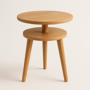 May include: A small, two-tiered wooden side table with a natural finish. The top tier is a round tabletop, and the lower tier is a smaller, round shelf. The table has three angled legs. The table is approximately 20 inches tall.