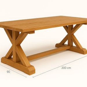 Może przedstawiać: Prostokątny drewniany stół z naturalnym wykończeniem. Stół ma podstawę w kształcie litery X i mierzy 200 cm długości, 90 cm szerokości i 75 cm wysokości. Odpowiedni do jadalni lub jako miejsce pracy.
