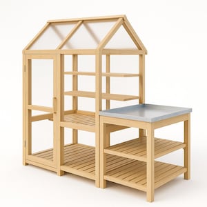 May include: A wooden potting bench with a greenhouse structure. The greenhouse has a clear roof and door, with shelves inside. The bench has a grey metal top and lower shelves, ideal for gardening tasks.