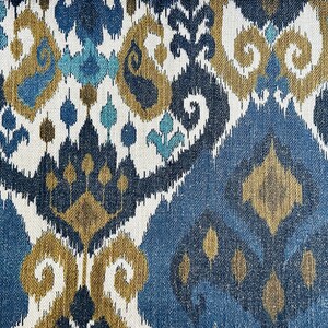 May include: Blue, brown, and white patterned fabric with an ikat design.