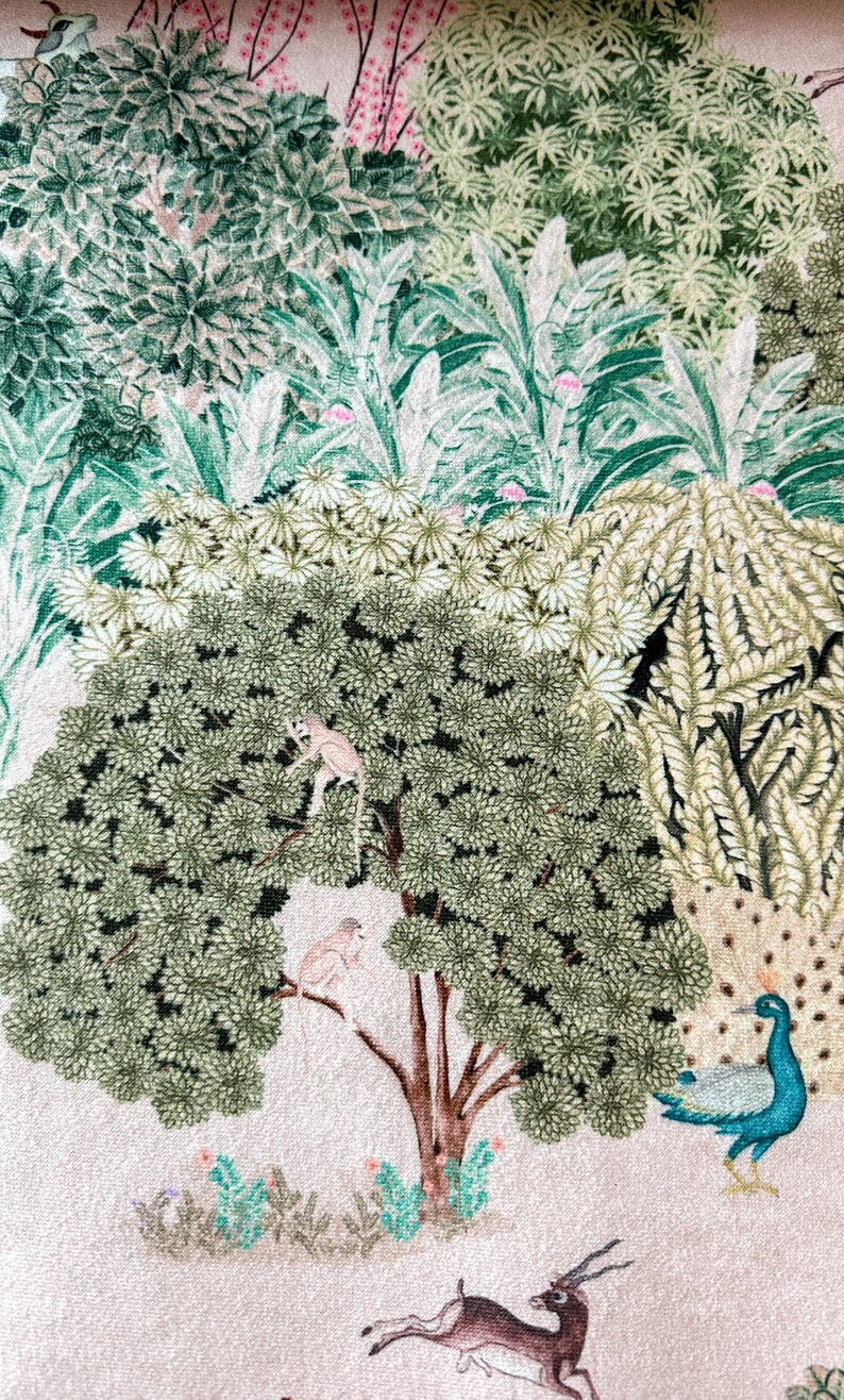 May include: A pink background with a green and brown tree with two monkeys in the branches. There is a peacock with blue and green feathers on the right side of the image. There are also small green plants and a brown deer with antlers.