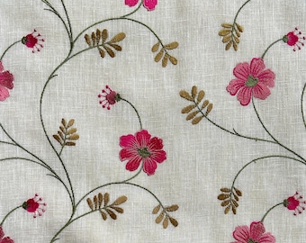 May include: A white fabric with embroidered pink flowers and brown stems. The fabric has a subtle linen texture.