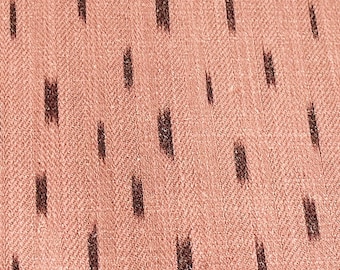 May include: Close-up of a brown fabric with a subtle herringbone weave and a repeating pattern of thin black vertical lines.