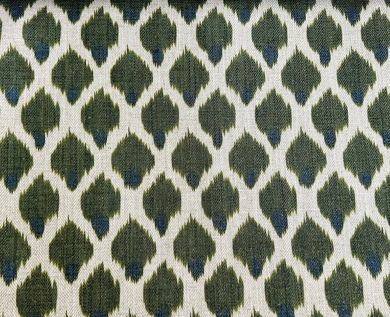 May include: Green and blue ikat fabric with a repeating pattern of teardrop shapes.
