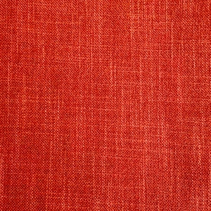 May include: Close-up of a red fabric with a textured woven pattern.