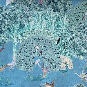 May include: A blue and green patterned fabric featuring a jungle scene. The fabric depicts peacocks, monkeys, deer, and trees.