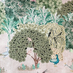 May include: A whimsical illustration of a forest scene with a peacock, monkeys, deer, and birds. The background is a light pink with green foliage and flowers.