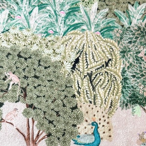 May include: A pink background with a green and brown jungle scene. There are peacocks, monkeys, deer, and trees. The scene is painted in a whimsical style.