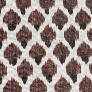 May include: Brown and white fabric with a repeating pattern of brown and black ikat-style shapes.
