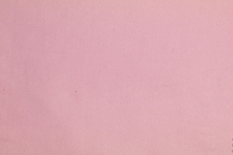May include: A solid pink background with a smooth, even texture.