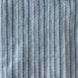May include: White fabric with vertical stripes of different shades of brown and gray.