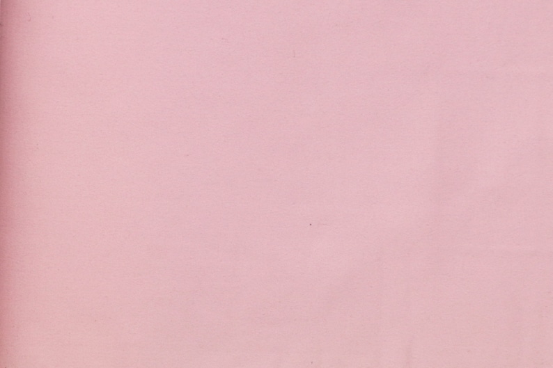 May include: A solid pink background.