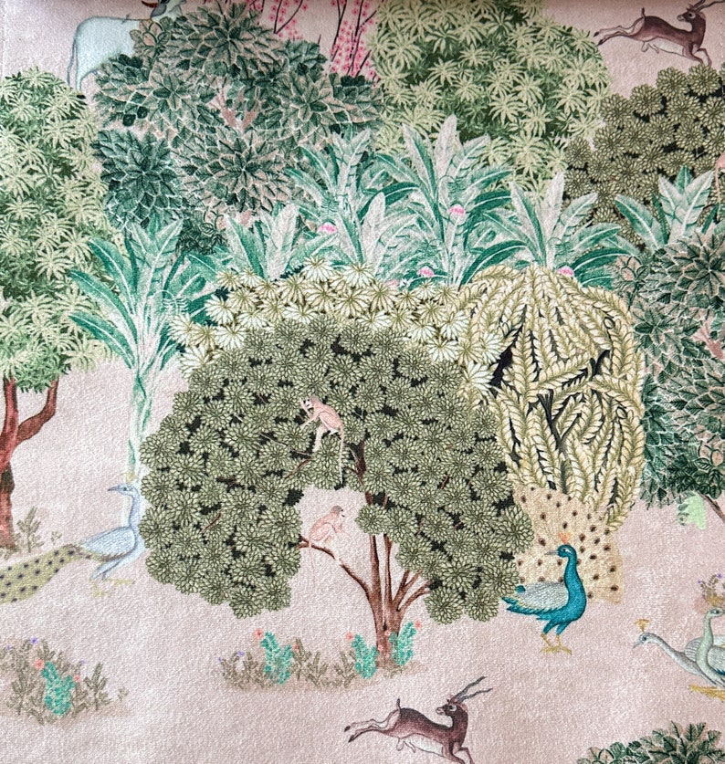 May include: A whimsical illustration of a forest scene with peacocks, monkeys, and deer. The background is a light pink with green trees and foliage.