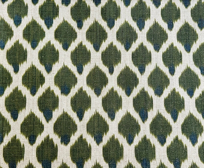 May include: Green and blue ikat fabric with a repeating pattern of diamond shapes.