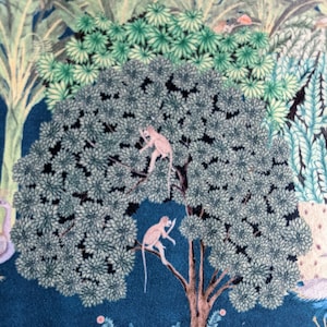 May include: A blue background with a large green tree with two pink monkeys in it. The tree has a brown trunk and branches. There are smaller green plants and flowers at the bottom of the image.