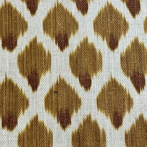 May include: White fabric with a repeating pattern of brown and tan ikat-style diamonds.
