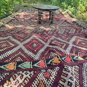 A very old Moroccan rug, made in 1986, hand-woven, wool. Order it to your home. Authentic Moroccan heritage decor.