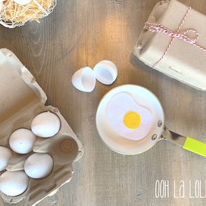 Half Dozen Farm Fresh Felt Eggs, includes six felt eggs, six plastic egg shells, and cardboard egg carton