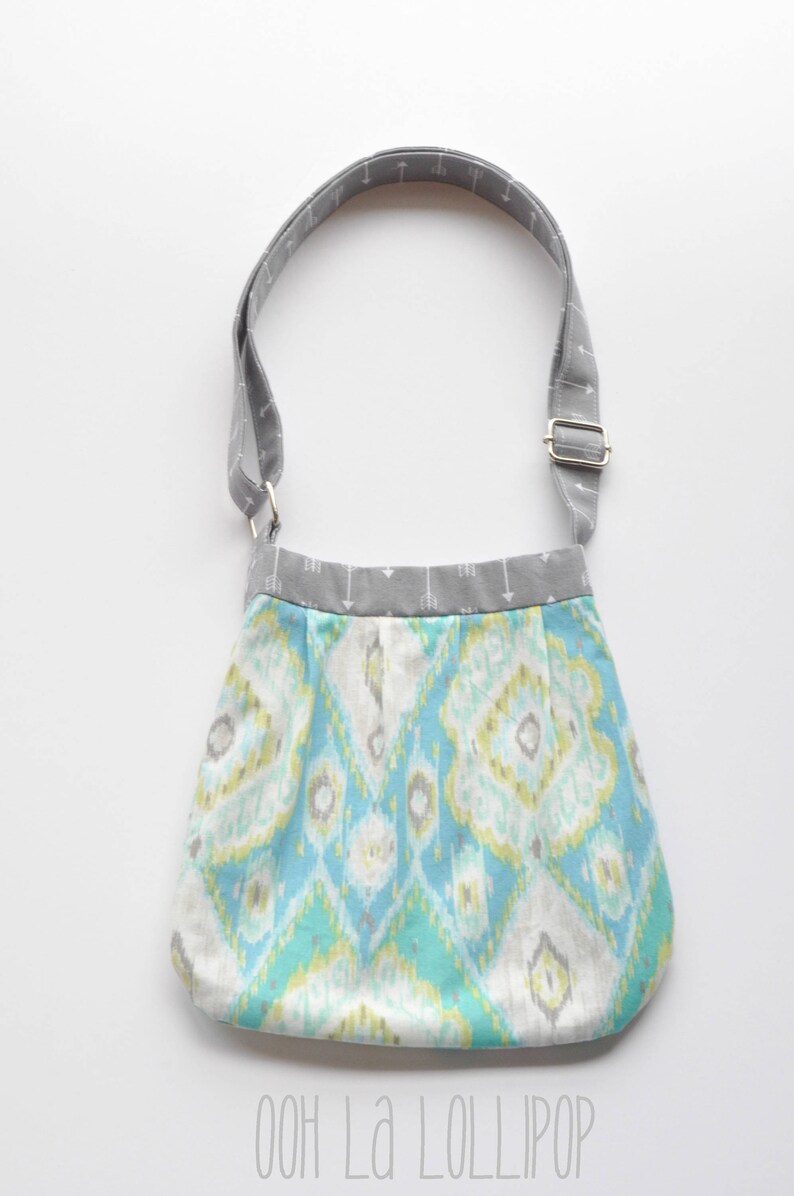 Adjustable Girl on the Go bag in beautiful aqua ikat print Girls Purse lined in gray arrow fabric