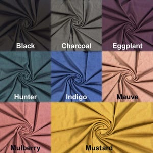 May include: A fabric swatch image showcasing nine different colors. The colors include black, charcoal, eggplant, hunter, indigo, mauve, mulberry, and mustard. Each color is labeled with its name in white text.