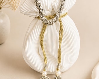 Luxury Ivory White Potli Swinging Bag with Gold and Silver Tassels