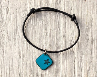 Turquoise Blue Star Bracelet, Enamel Charm on Black Cord, Black Star on Aqua Blue Charm Bracelet