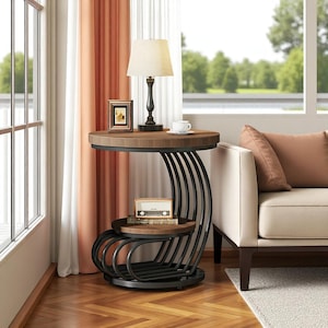 May include: A modern side table with a dark wood top and a black metal base. The table has a unique curved design with a lower shelf. A lamp, picture frame, and coffee cup are on the table.