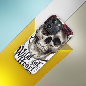iPhone&quot;iPhone Case with Skull and Rose Design – &#39;Wild at Heart&#39; Gothic Tattoo Style Cover for iPhone 11/12/13/14 – Edgy & Unique Gift&quot;