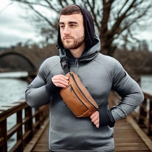 Gürteltasche|Gürteltasche aus Leder|Leder Gürteltasche|Umhängetasche|Schwarze Schultertasche|Halbmondtasche|Schwarze Umhängetasche|Bauchtasche|Reisetasche|Bananenform|Für Sie