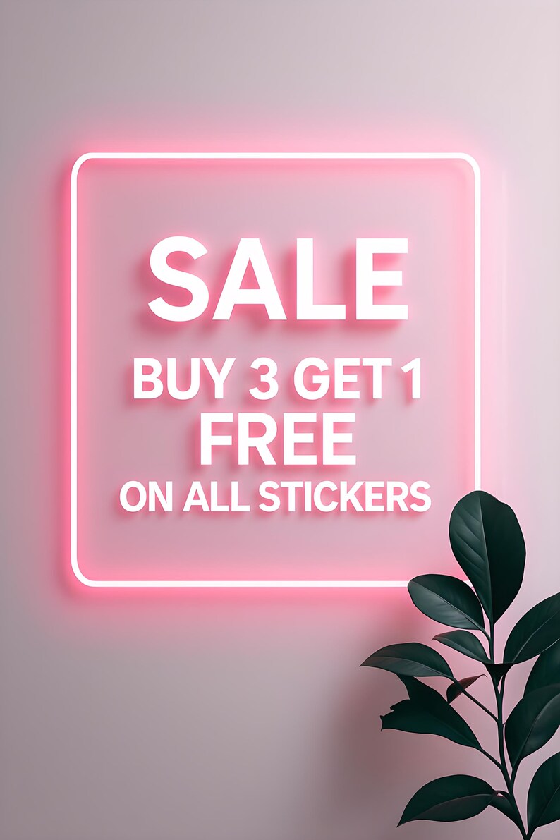 May include: A pink neon sign with the word "SALE" in white, along with "BUY 3 GET 1 FREE ON ALL STICKERS." A dark green plant is in the lower right corner. The sign has a square shape with rounded corners.