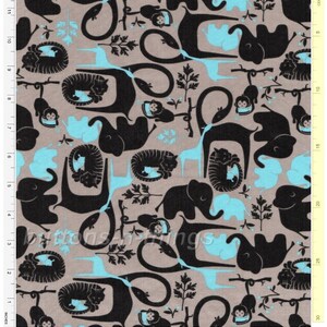 May include: Fabric with a repeating pattern of black stylized animals, including elephants, monkeys, and tigers, on a tan background. Light blue shapes and small tree branches fill the spaces between the animals. The fabric is marked with inches and centimeters.