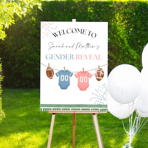 Puede incluir: Un letrero rectangular para revelación de género con el texto Welcome to Sarah and Matthew's Gender Reveal. El diseño incluye ilustraciones de un balón de fútbol americano, un body azul, un body rosa y otro balón colgados en un tendedero.
