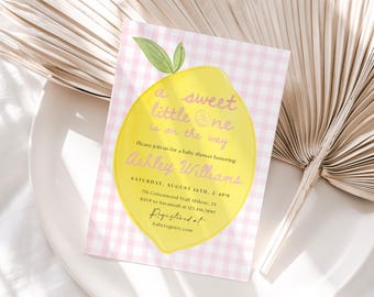 May include: A baby shower invitation with a yellow lemon design and green leaves, set against a pink gingham pattern. The invitation text announces "a sweet little one is on the way" and provides baby shower details for Ashley Williams.